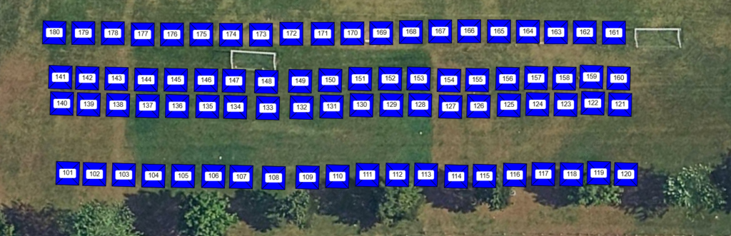 Aerial view of three rows of blue square markers labeled 101–120, 141–160, and 161–180 on a grassy field, with two white goal frames at opposite ends.